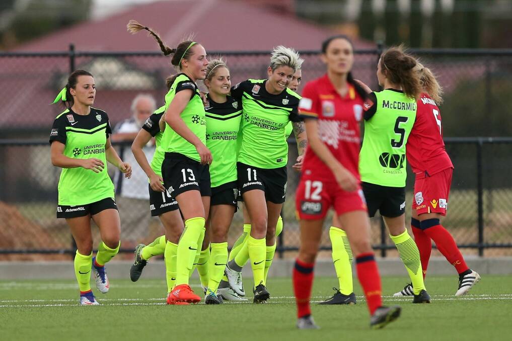 Canberra United celebrate Ellie Brush's first half goal against Adelaide. Photo: James Elsby