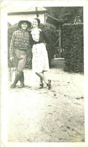 Jim Brooks, jackeroo,  and Anne Smith, cook, Lanyon homestead courtyard c. 1940. Photo: Supplied