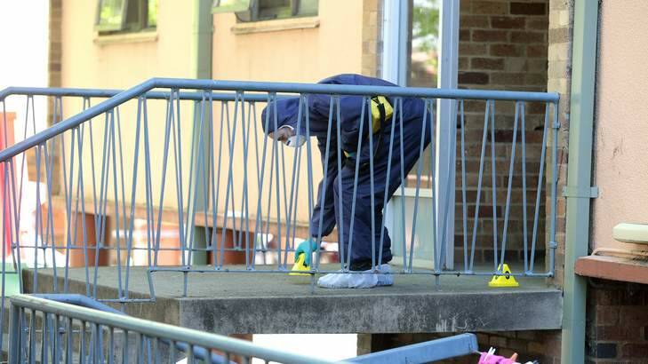 ACT Policing Forensics member at Bega Court in Reid. Photo: Jeffrey Chan