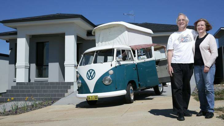 Jim Smith and Kristine Riethmiller of Wright in front of their home away from home a 1967 Kombi Camper.  Photo: Jeffrey Chan