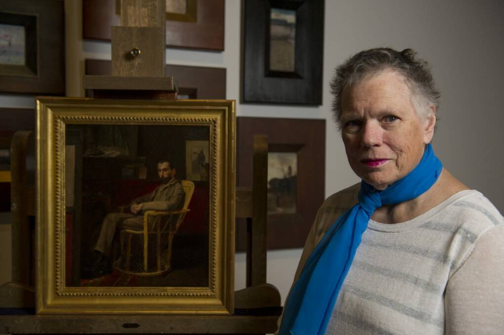 Buying: Anna Gray with a Tom Roberts painting acquired from a private collection.
 Photo: Jay Cronan