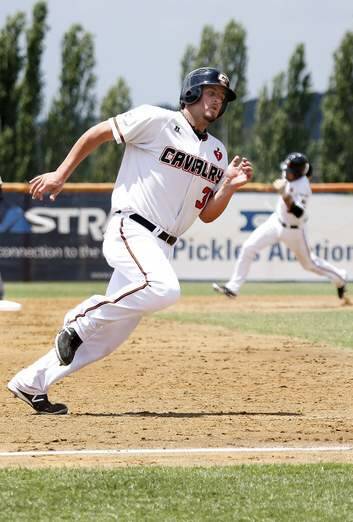 Cavalry's Aaron Sloan rounds third to add another run on Sunday. Photo: Jeffrey Chan