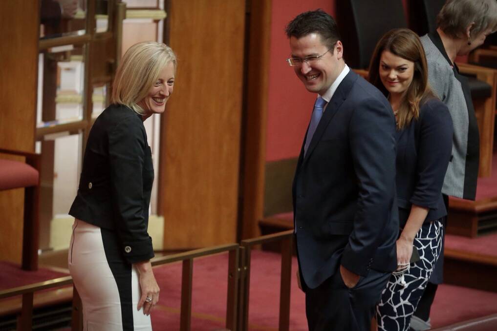 Katy Gallagher and Zed Seselja at Parliament House when Ms Gallagher was sworn in as a new Senator for the ACT. Photo: Andrew Meares