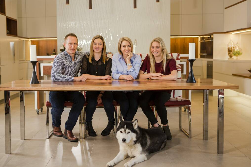 Founder and chief executive of Clear Complexions Suzie Hoitink with her family, from left, Alex, Ellie, 15, Suzie, Grace, 17, and their dog, Chinook. Photo: Jamila Toderas
