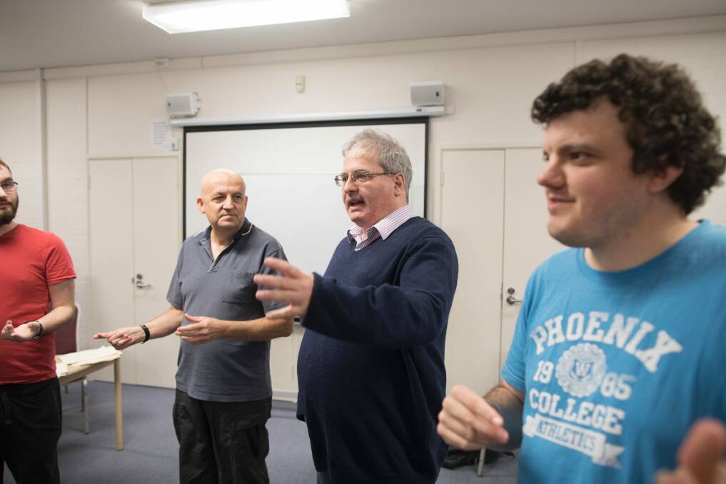 Arts reporter Ron Cerabona, second from right, participates in a word association exercise at the National Acting School in Dickson. Photo: Sitthixay Ditthavong