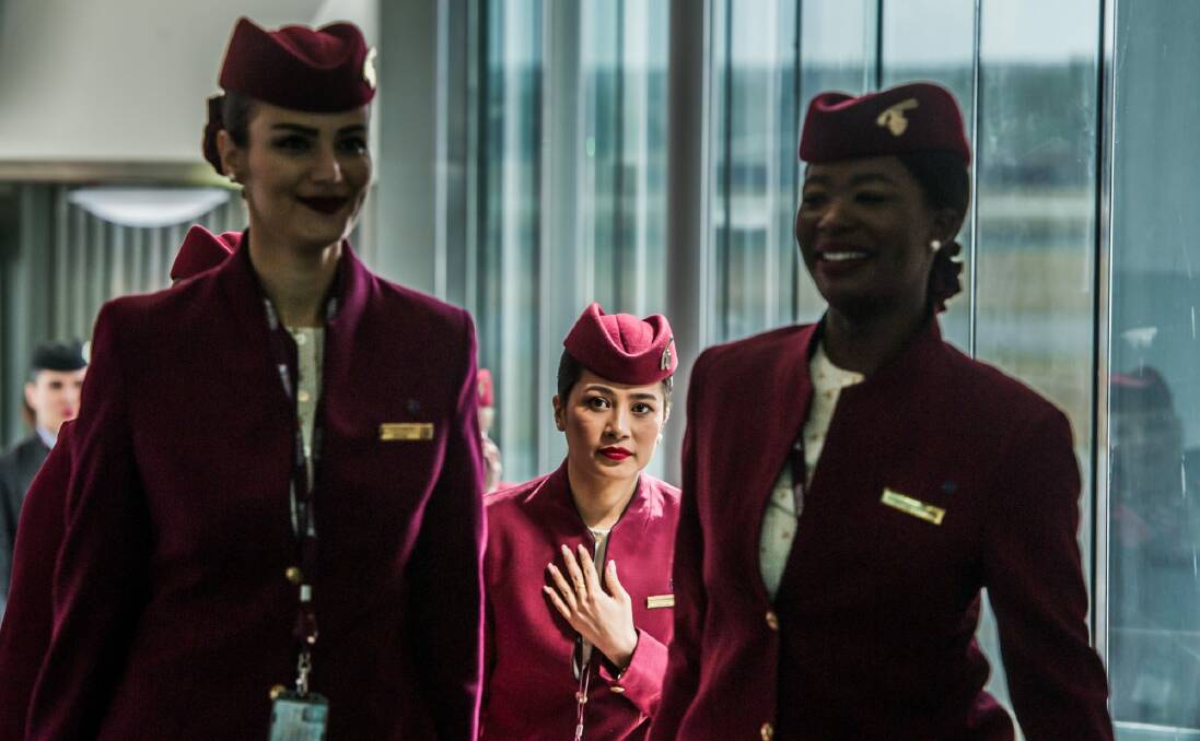 Qatar Airways crew disembark from the first plane to land in Canberra on its new daily Doha service. Photo: karleen minney
