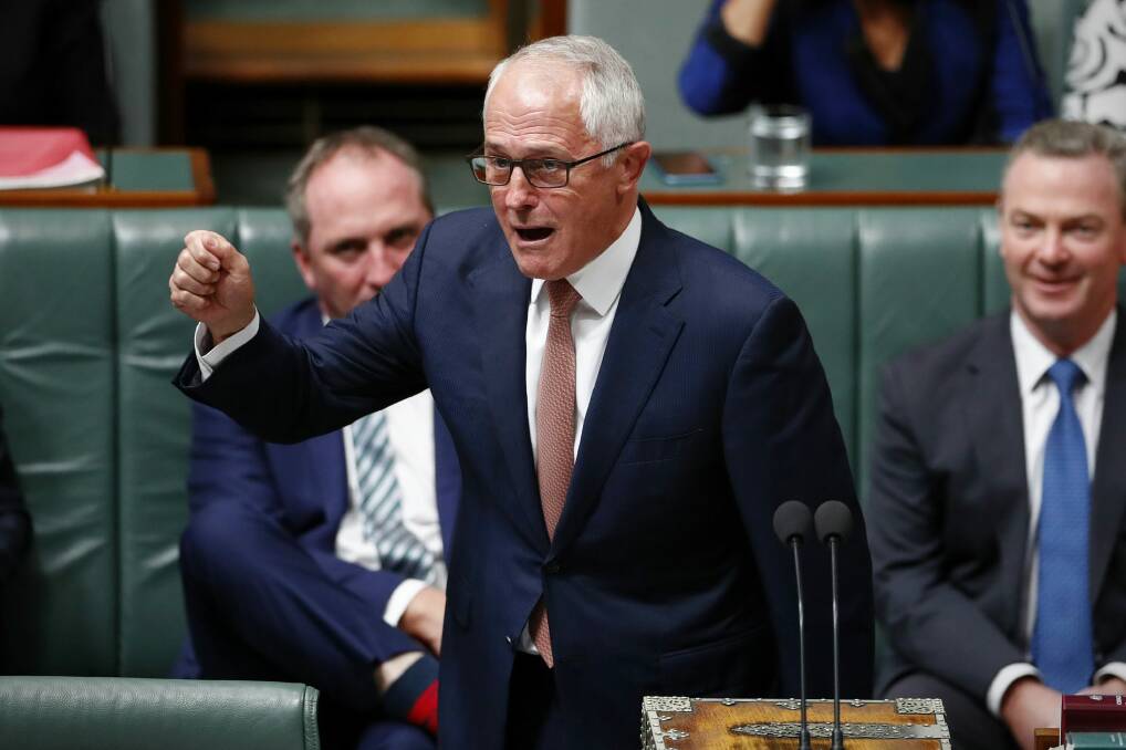 Malcolm Turnbull is being pulled by his colleagues towards the right fringe. Photo: Alex Ellinghausen