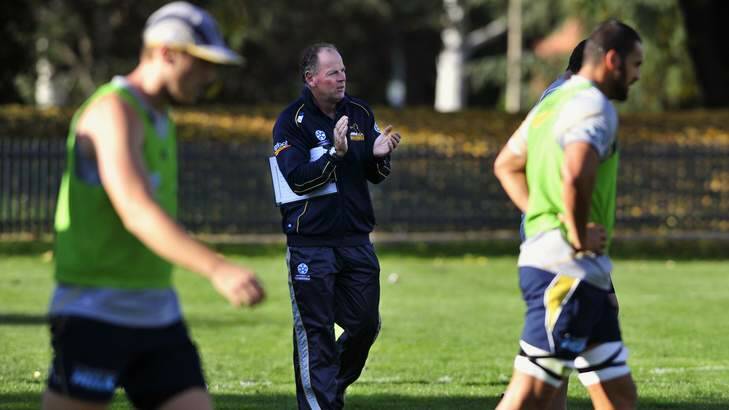 Brumbies coach Jake White, centre, has engaged in a pre-match stats exchange. Photo: Jeffrey Chan