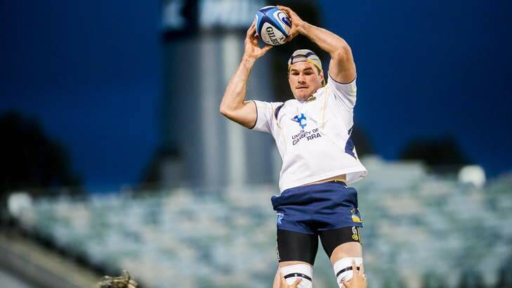 Ben Mowen catches the ball during the Brumbies' captain's run on Saturday night. Photo: ROHAN THOMSON