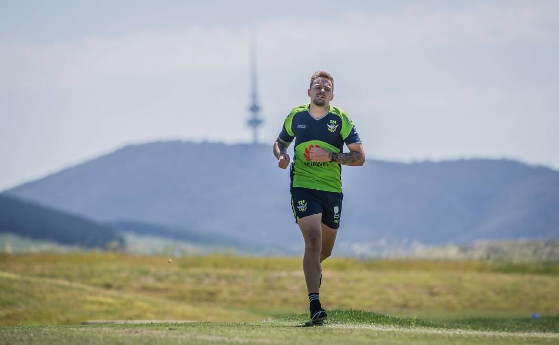 Blake Austin takes to the running track at Stromlo Forest Park as the Raiders begin  pre-season training. Photo: Karleen Minney