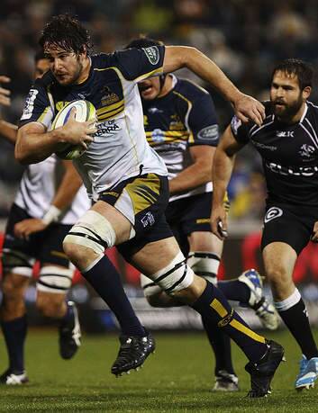 Sam Carter of the Brumbies runs the ball against the Sharks. Photo: Getty Images