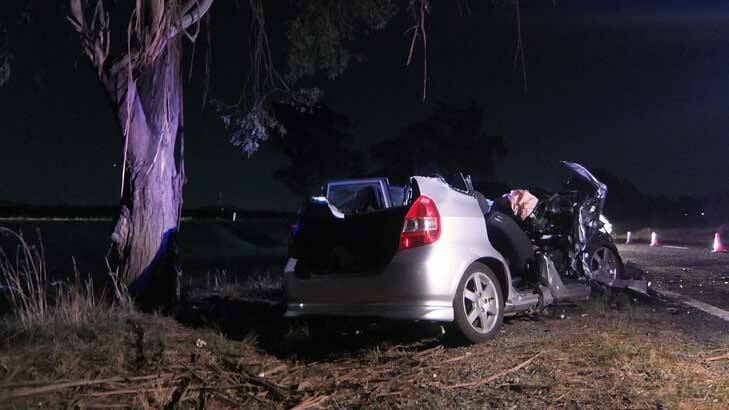 A 35-year-old man was cut from the wreckage of his car after crashing into a tree on the Monaro Highway near Hume about 3.40am on Monday. Photo: John-Paul Moloney