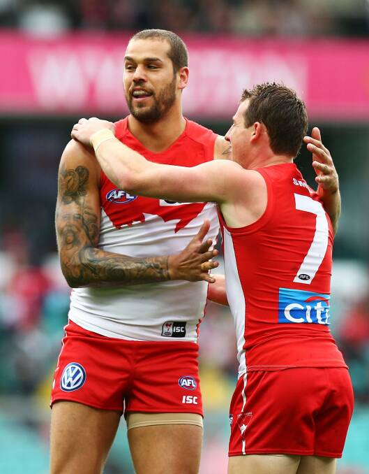 Celebration: Lance Franklin and Harry Cunningham celebrate another goal for the Swans against Port Adelaide at Sydney Cricket Ground. Photo: Getty Images