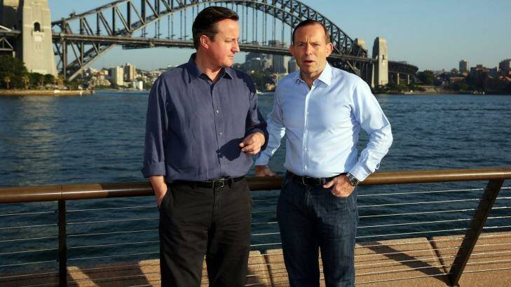 At least Tony Abbott, a shirt expert, got the top half of his outfit correct.   Photo: AFP