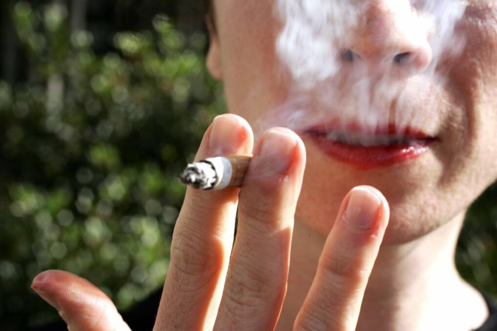 A total of 2.7 million Australians are daily smokers.  Photo: Tamara Voninski