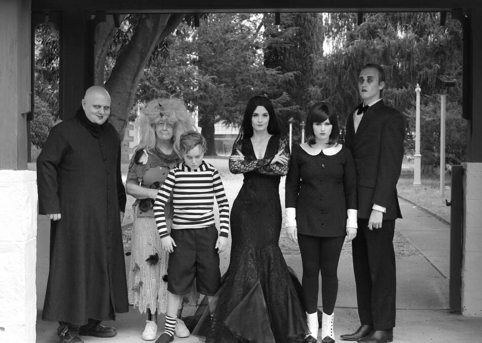 In <i>The Addams Family</i>: from left, Uncle Fester (Tim Stiles), Grandma (Barbara Denham), Morticia (Lainie Hart), Wednesday (Rachel Thornton), Lurch (Nathan Rutups). Photo: Deon Myburgh