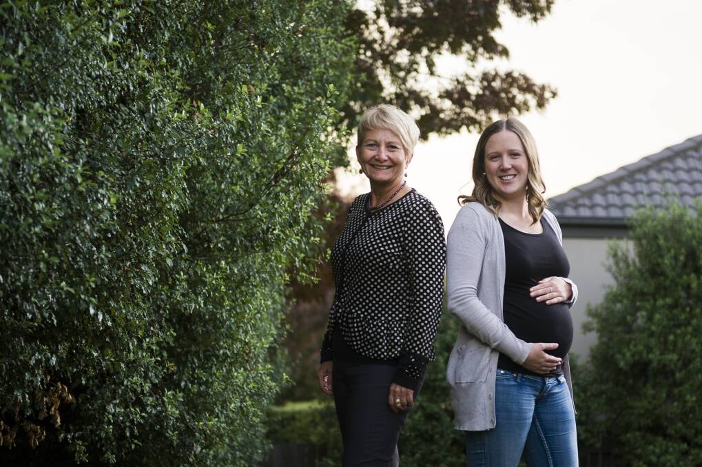 Professor of midwifery at the University of Canberra and ACT Health Deborah Davis who led the research, and expectant mother and midwife Sam Lawry (right) Photo: Dion Georgopoulos