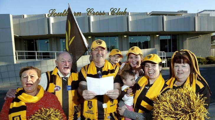 Canberra Hawks supporters show their colours in preparation for the 2013 final.  Photo: Jeffrey Chan