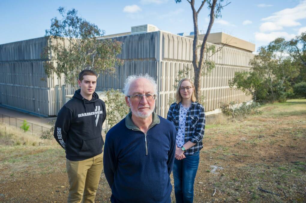 Red Hill resident association members George Barrows, and Michaela Cully-Hugill stand with Red Hill Regenerators' Michael Mulvaney.  Photo: Dion Georgopoulos