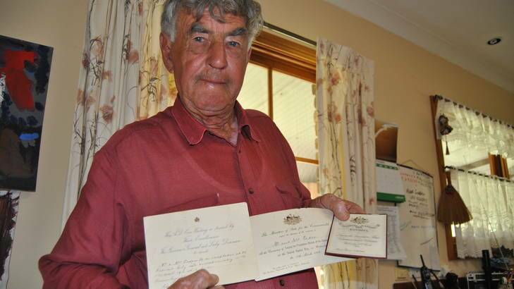 Robert Peden with invitations to the laying of the Canberra foundation stone. Photo: Antony Dubber/Goulburn Post