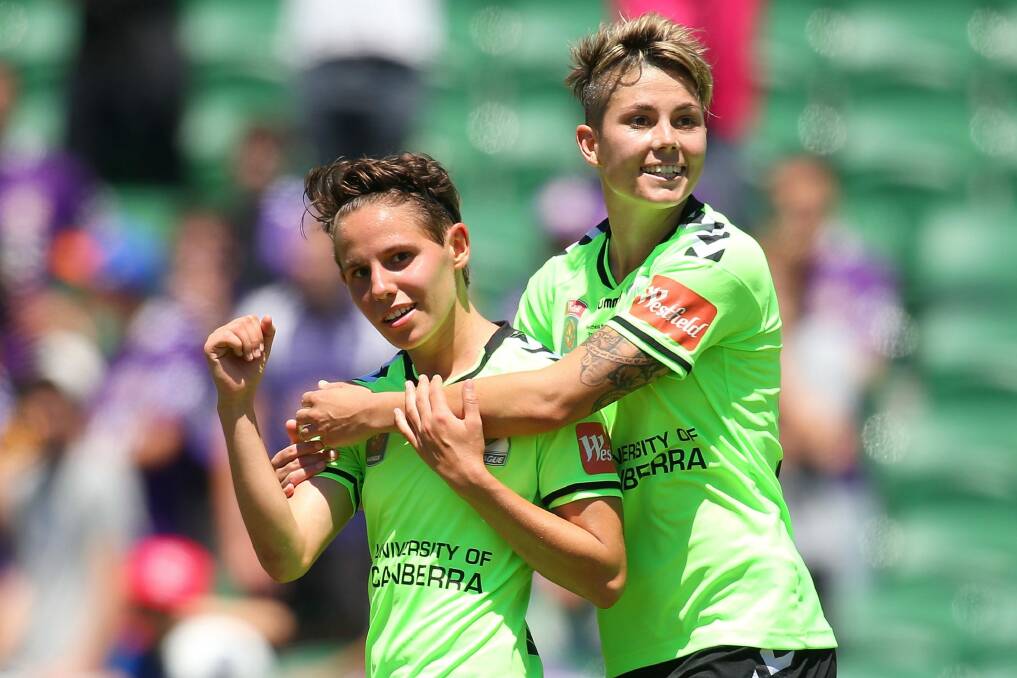Canberra United duo Ashleigh Sykes and Michelle Heyman have been caught up in the Matildas' pay dispute with the FFA. Photo: Getty Images