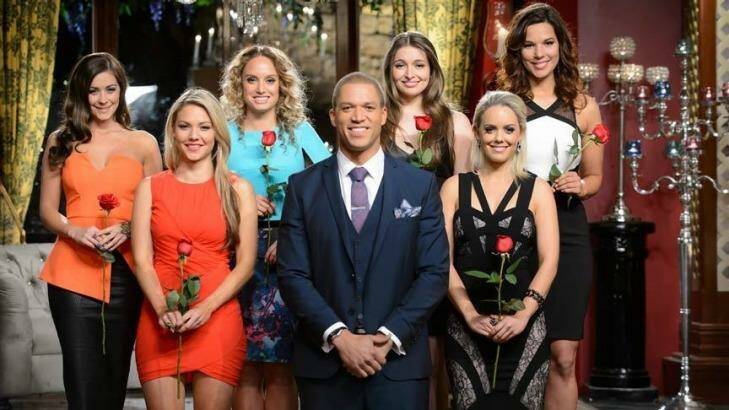 Seven left (not including an ill Laurina) ... Rose winners on Episode 13 stand with The Bachelor, Blake Ferguson. Photo: Network Ten
