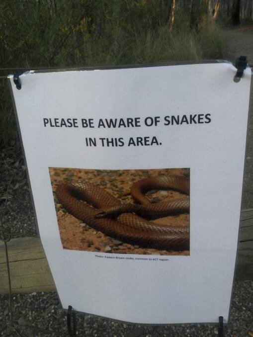 Calvary Hospital in Canberra is using signs to warn people of snakes in their car park as well. Photo: Facebook/Frances Jones
