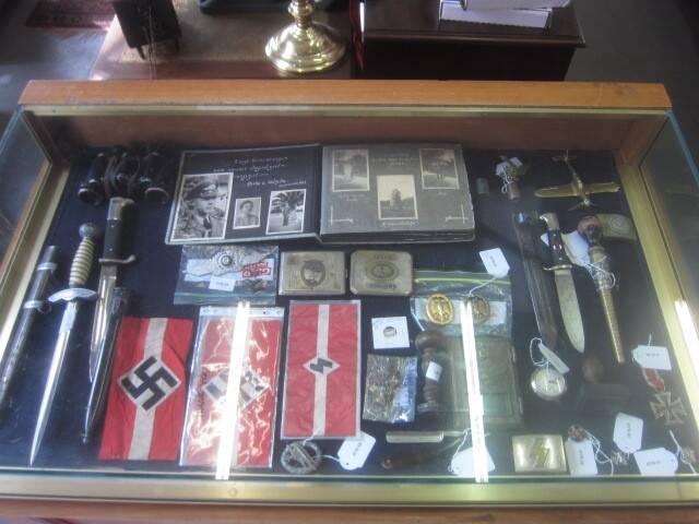 Symbols of hate: Part of a collection of Nazi memorabilia which was auctioned off in the ACT over the past two months. Photo: The Auction Barn