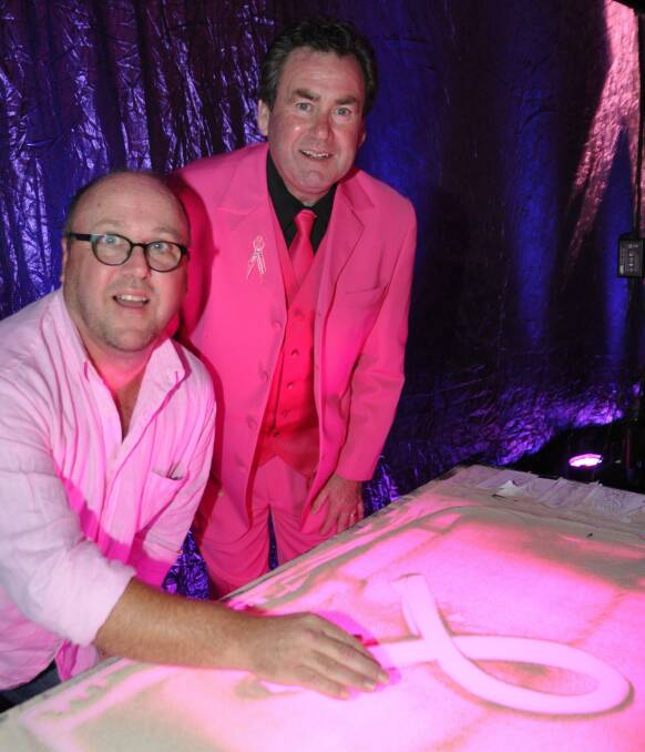 24 October 2012. Canberra Times Photo by LYN MILLS for SOCIALS Pink Dinner at the Hyatt Hotel Sand Artist Brett Bowler with MC Paul Walshe Photo: Lyn Mills