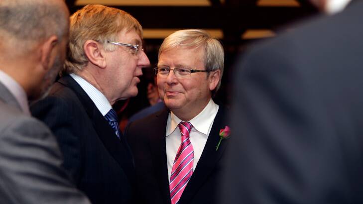 Chinese whispers: Kevin Rudd with cabinet supporter Martin Ferguson. Photo: Angela Wylie