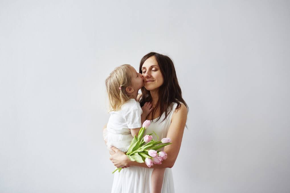 A kiss might be the best Mother's Day gift of all.  Photo: iStock