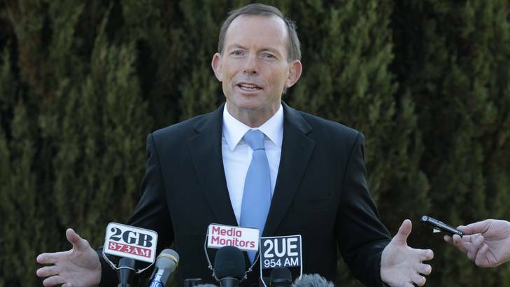 Opposition Leader Tony Abbott says any savings the Coalition can find in Defence bureaucracy will be reinvested in greater military capacity. Photo: Andrew Meares