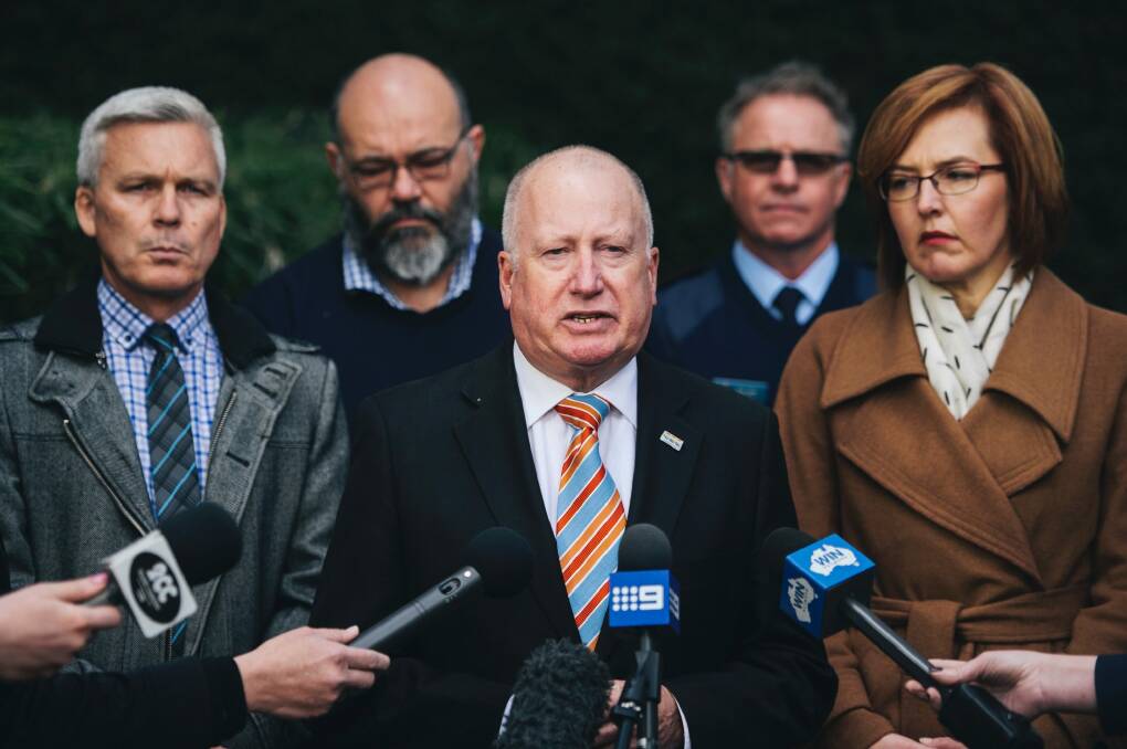 Meegan Fitzharris and Mick Gentleman respond to questions from the media regarding the decision to replacing cladding on the Centenary Hospital for Women and Children. Photo: Rohan Thomson