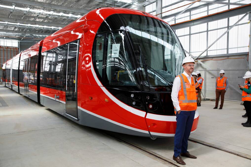 ACT chief minister Andrew Barr with Canberra's first light rail vehicle at its depot in Mitchell.  Photo: Sitthixay Ditthavong