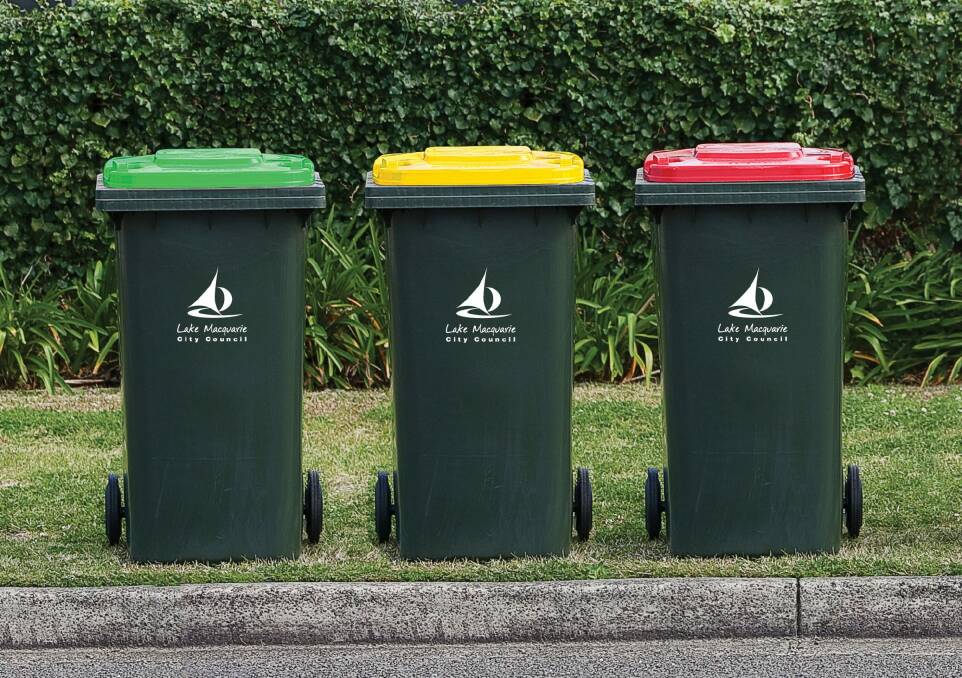 Pictures shows Lake Macquarie's three bins. The green-lid bin is for green waste, the red-lid bin for general waste, the yellow-lid bin for recycling. Photo: Damon Cronshaw