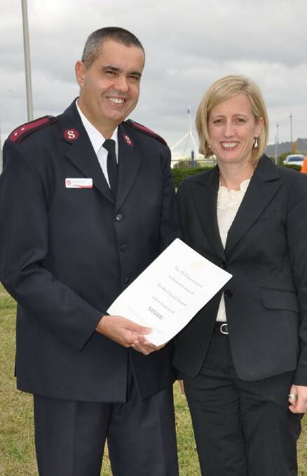 Flag Raising for Salvation Army Red Shield Appeal. Pic shows Dale Murray and Chief Minister Katy Gallagher Photo: Lyn Mills