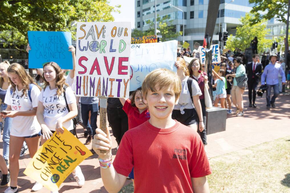 North Ainslie primary student George Breusch, 10, skipped school to attend the rally. Photo: Terry Cunningham