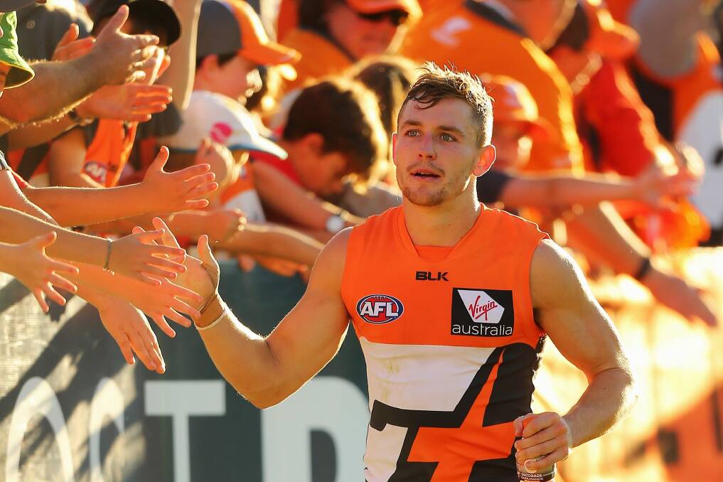 Devon Smith of the Giants thanks fans after the round two AFL match at Manuka. Photo: Joosep Martinson
