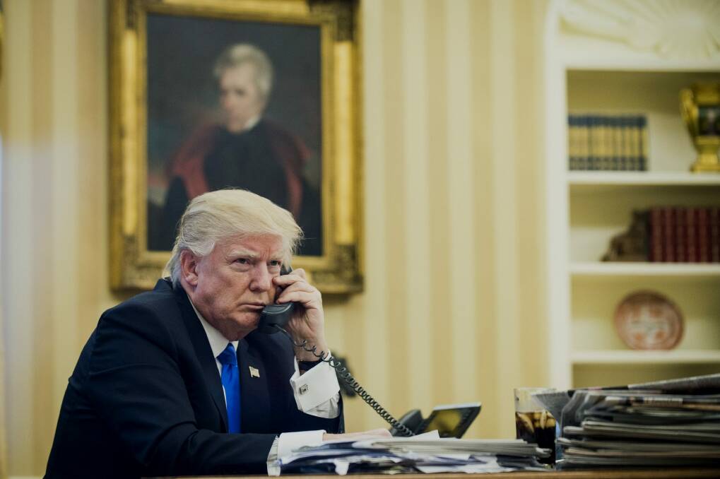 US President Donald Trump speaks on the phone with Malcolm Turnbull on Sunday morning.  Photo: Bloomberg