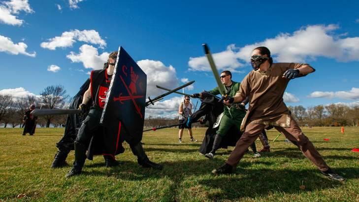 The Hundred Swords held a 'Boot Camp of Doom' training session on the lawns in front of the National Library. Photo: Katheirne Griffiths