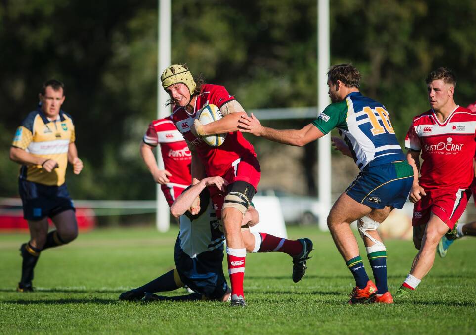  Tuggeranong flanker Ben Hyne charges the Uni-Norths defence. Photo: Sitthixay Ditthavong