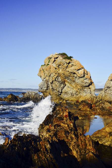 Rock pool at Beauty Point, Bermagui. Look at the centre left of the main rock: can you see the scary face looking left?  Photo: Mick McKeown