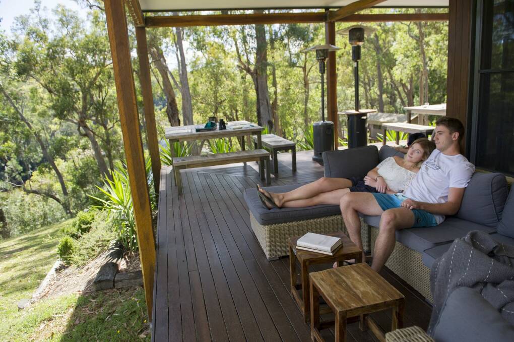 Ethan Harley and and Alex Mackenzie of  Sydney, enjoy the relaxed settings of The Escape luxury camping. Photo: Jay Cronan