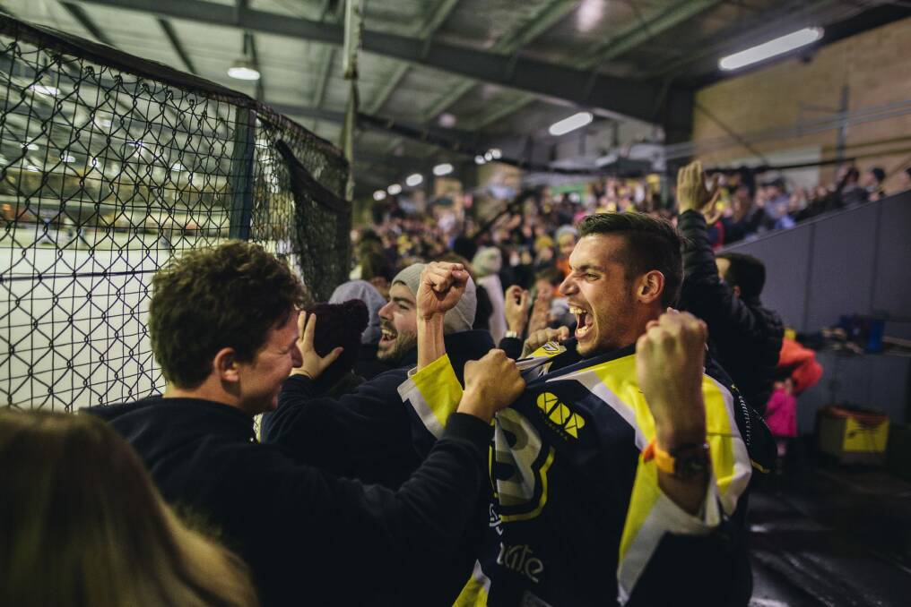 Canberra Brave fan Brad Clarke celebrates a goal.



 Photo: Rohan Thomson