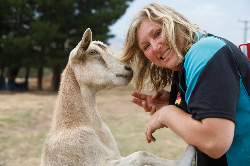 Noah's Ark Farm Friends Petting Zoo owner Cath Rogers with one of her friendly goats. Photo: Sitthixay Ditthavong