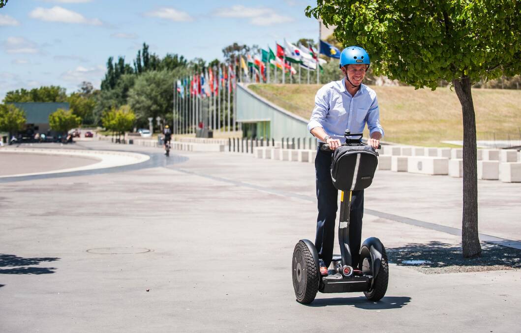 Justice and Consumer Affairs Minister Shane Rattenbury announces new road rules for private and commercial Segway use.  Photo: Elesa Kurtz