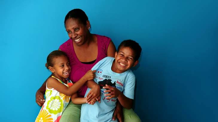 Leon Kanas, 9, from Vanuatu with his mum Tourana, 36, and sister Angelina, 4. Photo: Melissa Adams