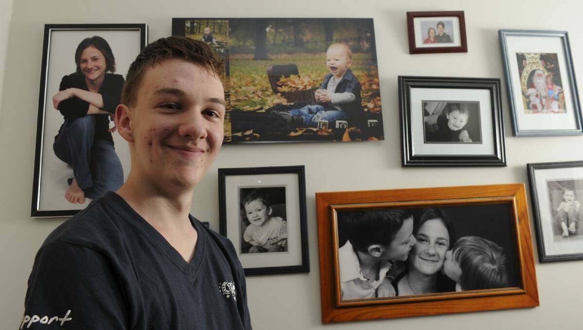 16-year-old Dylan Catterick with a photo of his little brother Josh. Photo: Graham Tidy