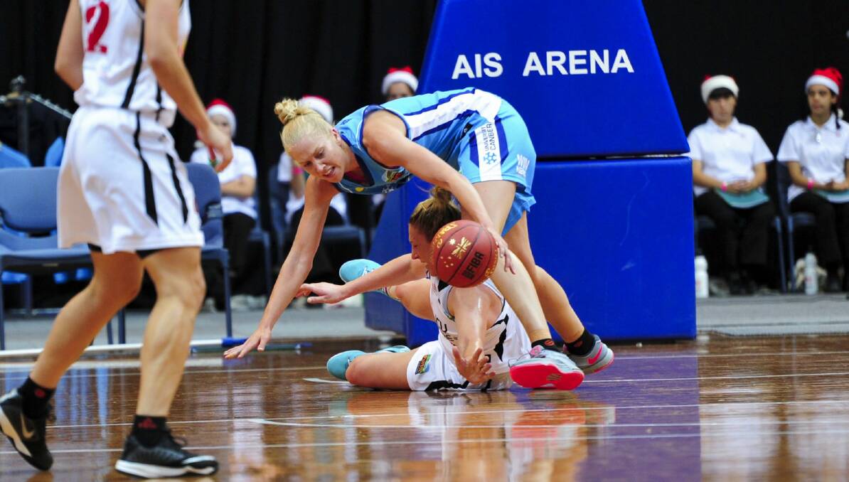 Abby Bishop tried hard but couldn't lift the Canberra Capitals to a win over Townsville Fire at the AIS Arena. Photo: Melissa Adams