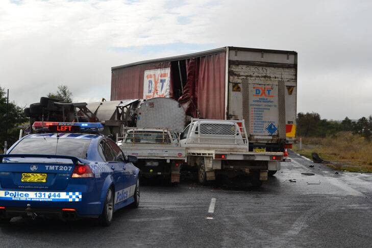 Two utes were also involved in the five-vehicle pile-up. Photo: Oliver Watson
